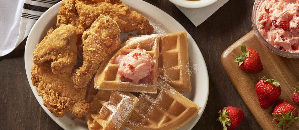 Plate of Fried chicken & Waffles with strawberry butter