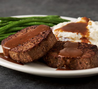 Meatloaf with green beans and mashed potatoes and gravy