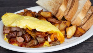 Meat lovers Omelet breakfast for dinner