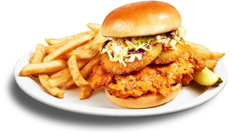 Buffalo Chicken Sandwich with onion rings and fries